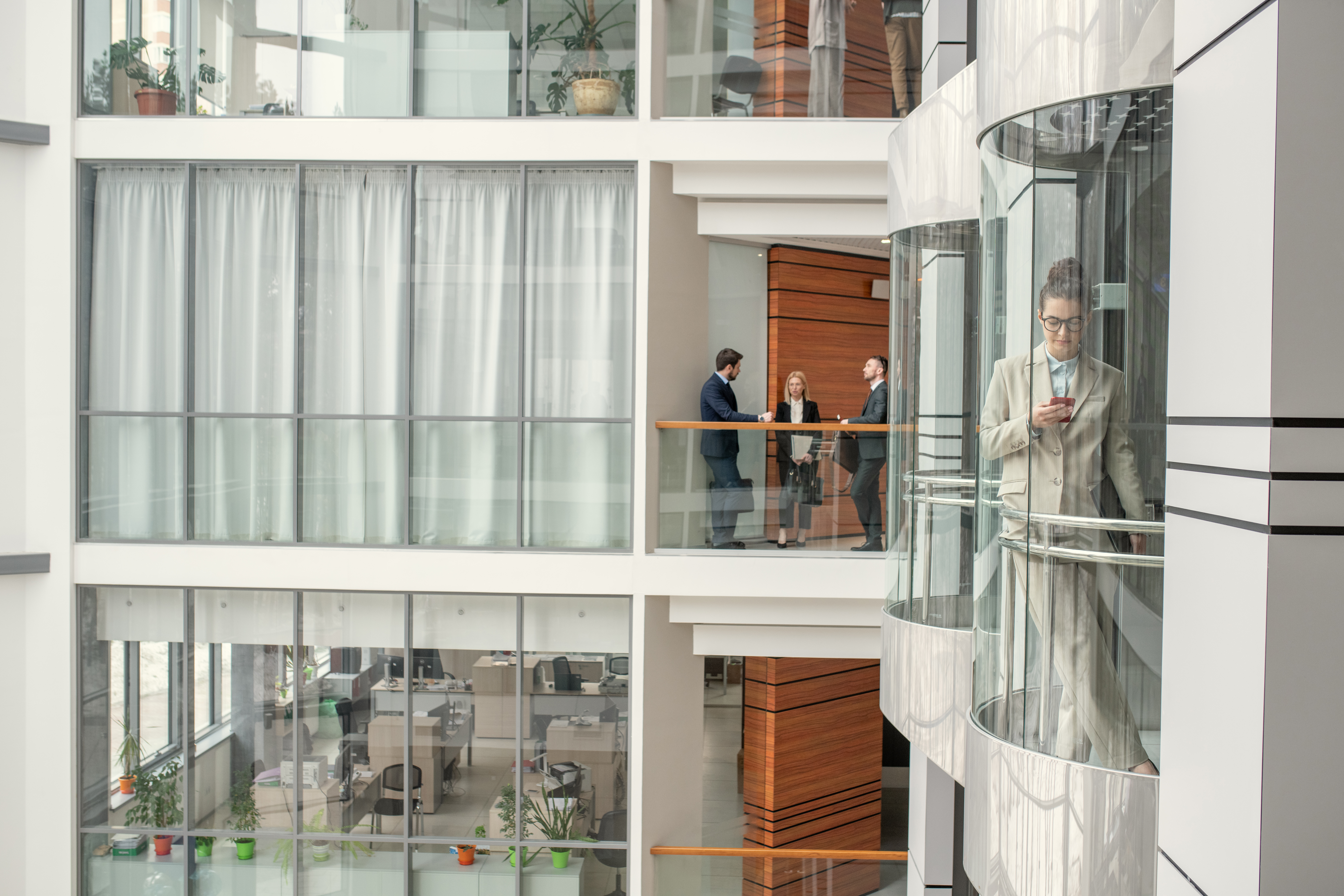 Modern commercial office building interior, relevant to indoor air quality testing in professional workplaces.