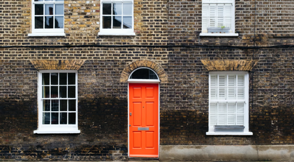 Traditional brick property showing signs associated with moisture effects in traditional buildings.